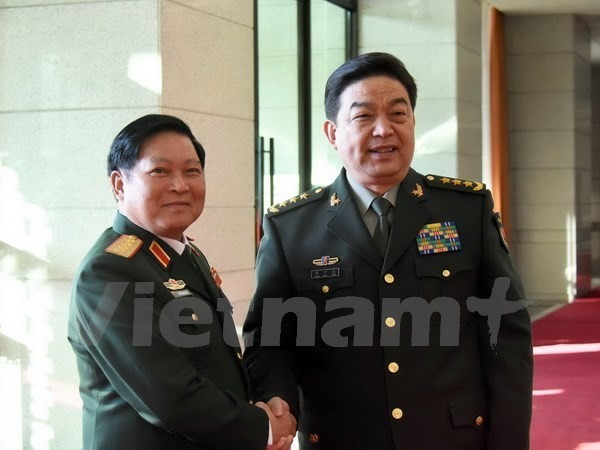 Vietnamese, Chinese military officials determined to lift bilateral ties to new height - ảnh 1